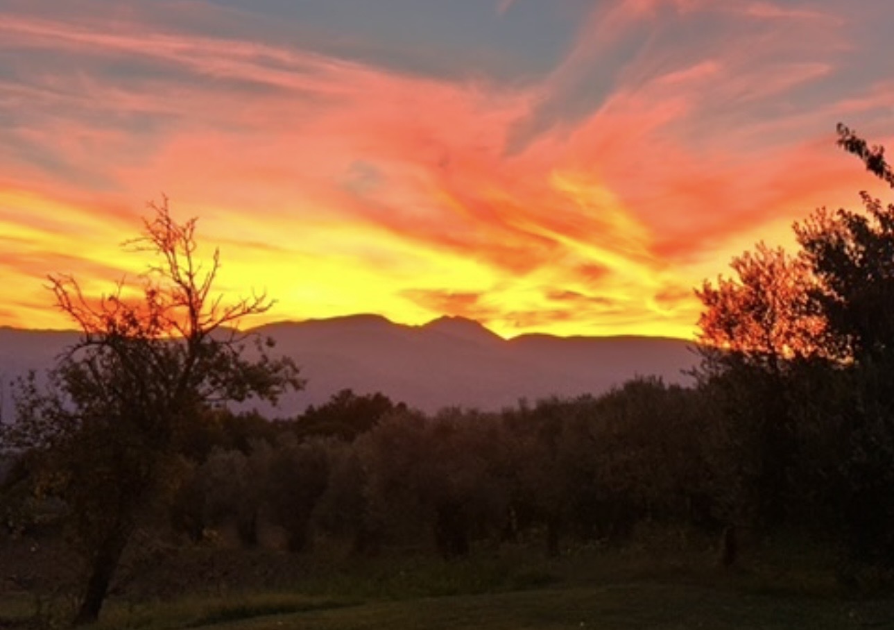 A sunset over the mountains